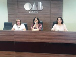 Leitura e aprovação do Regulamento da 1¤ Macrorregional preparatória para a 1¤ Conferência Estadual de Vigilância em Saúde, no auditório da OAB, no bairro de Hacarecica, em Maceió. Na Mesa, a secretária executiva do CES, Fátima Carnaúba, a técnica Simone Estela e a apoiadora técnica do COSEMS, Kathleen Moura. A imagem pode conter: 3 pessoas, área interna A imagem pode conter: uma ou mais pessoas, pessoas sentadas e área interna A imagem pode conter: 1 pessoa, sentado e área interna A imagem pode conter: 4 pessoas, pessoas sentadas e área interna